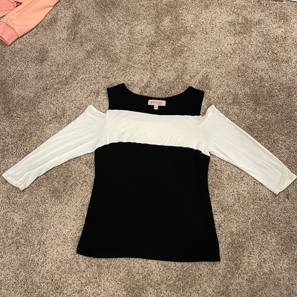 Rayon Spandex peek-a-boo shoulder top.